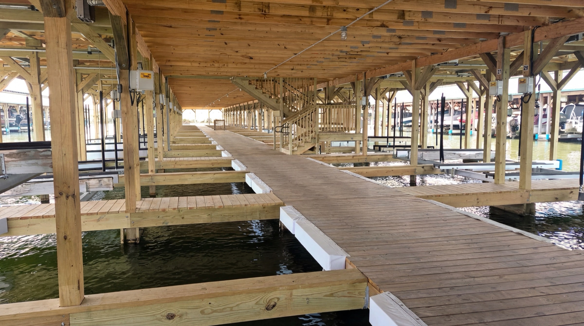 Covered slips with lifts keep your boat ready.